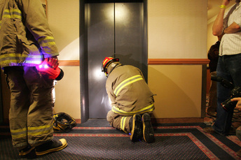 Firefighters responding to a trapped person in the elevator